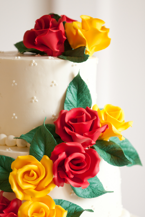 wedding cake red and yellow flowers oregon